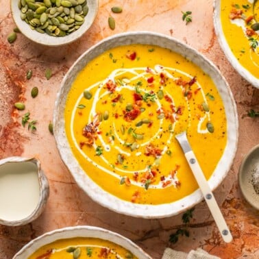 an overhead shot of butternut squash soup in a bowl