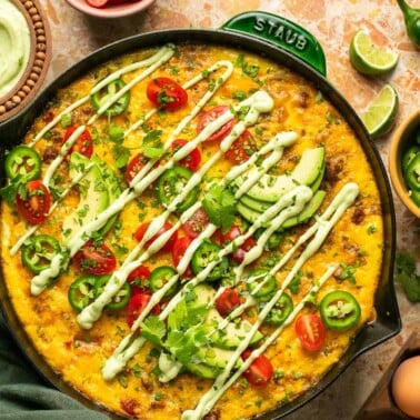 an overhead shot of a mexican frittata in a large skillet