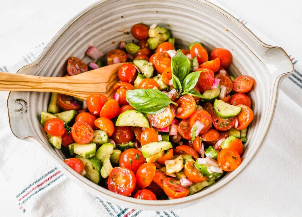 Tomato and Cucumber Salad in a gray bowl