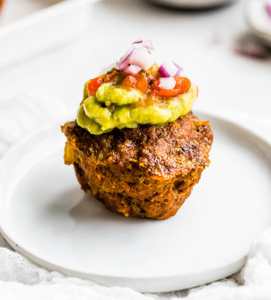 Mini taco meatloaf muffin with guacamole and salsa