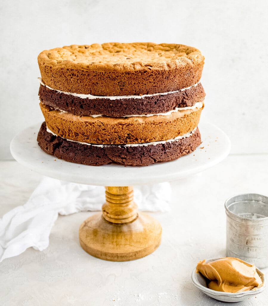 Brownie Cookie Cake layered on cake stand