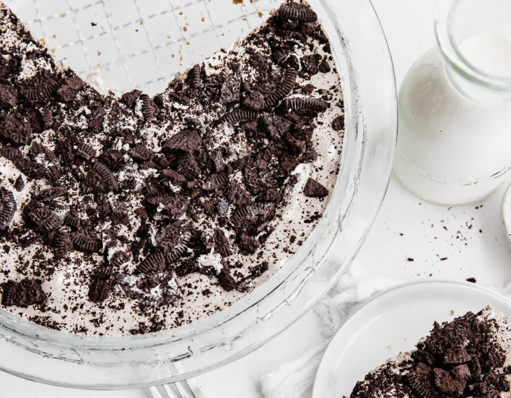 Cookies & Cream Fluff Pie with a jar of milk