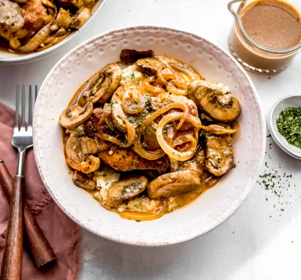 smothered pork chops with mushrooms, onions, and gravy. 