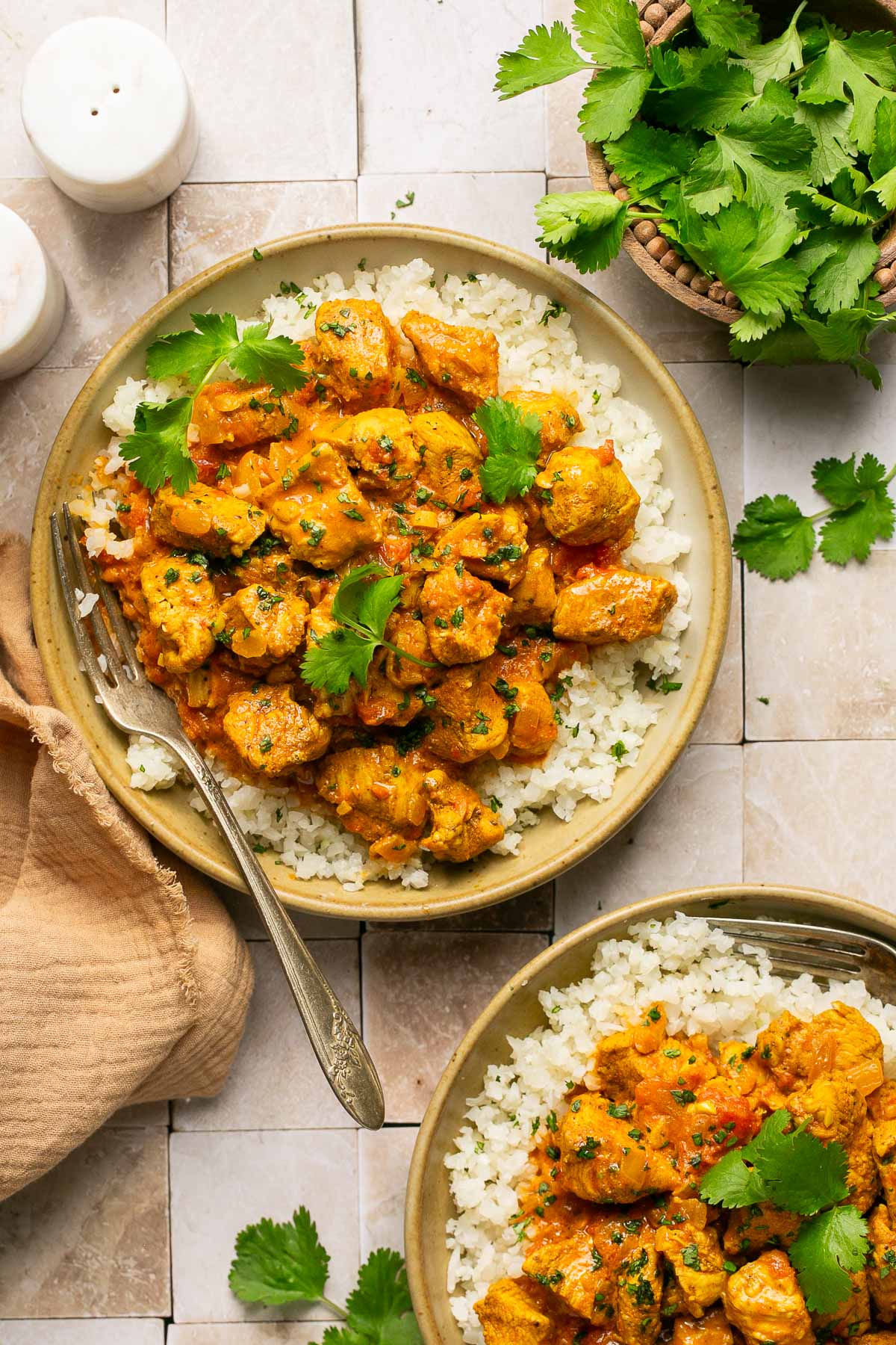 two bowls of keto butter chicken