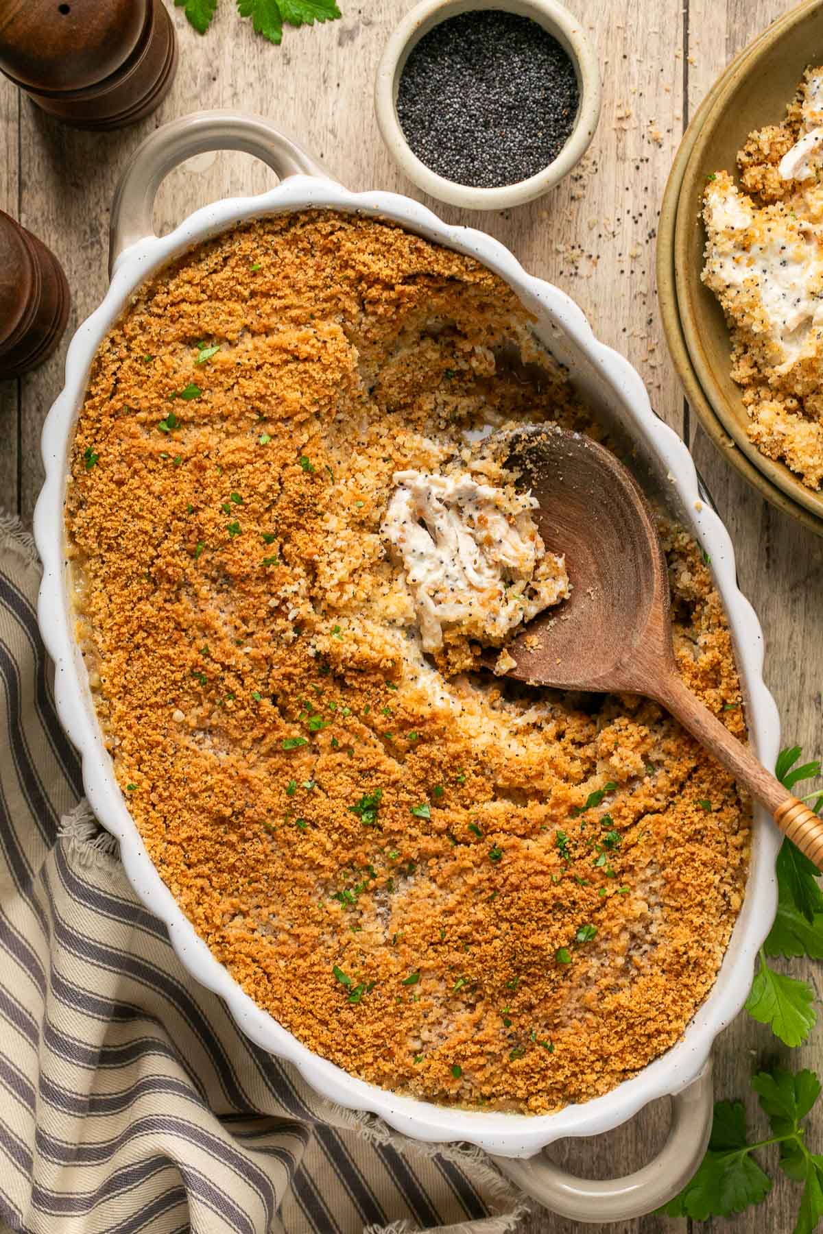 An overhead shot of the Poppy Seed Chicken Casserole with a spoon 