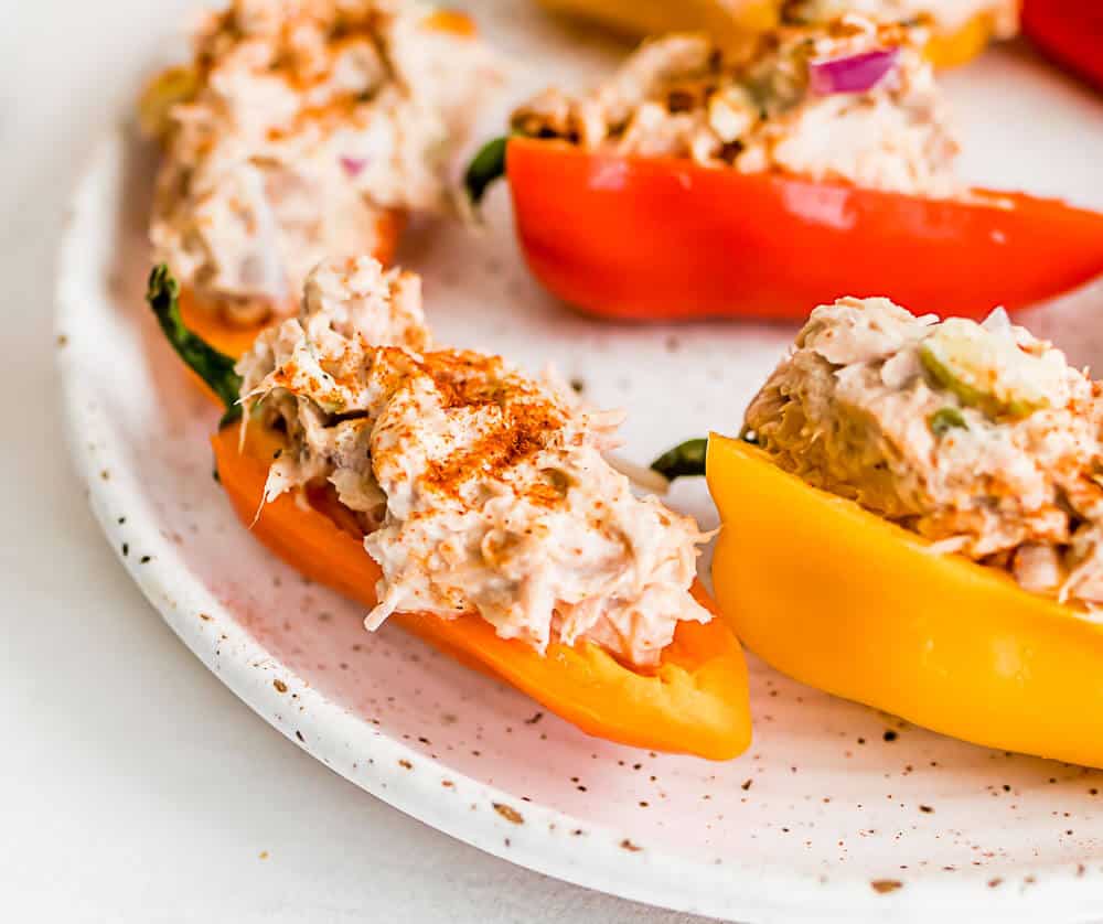 a close up picture of a stuffed pepper with tuna