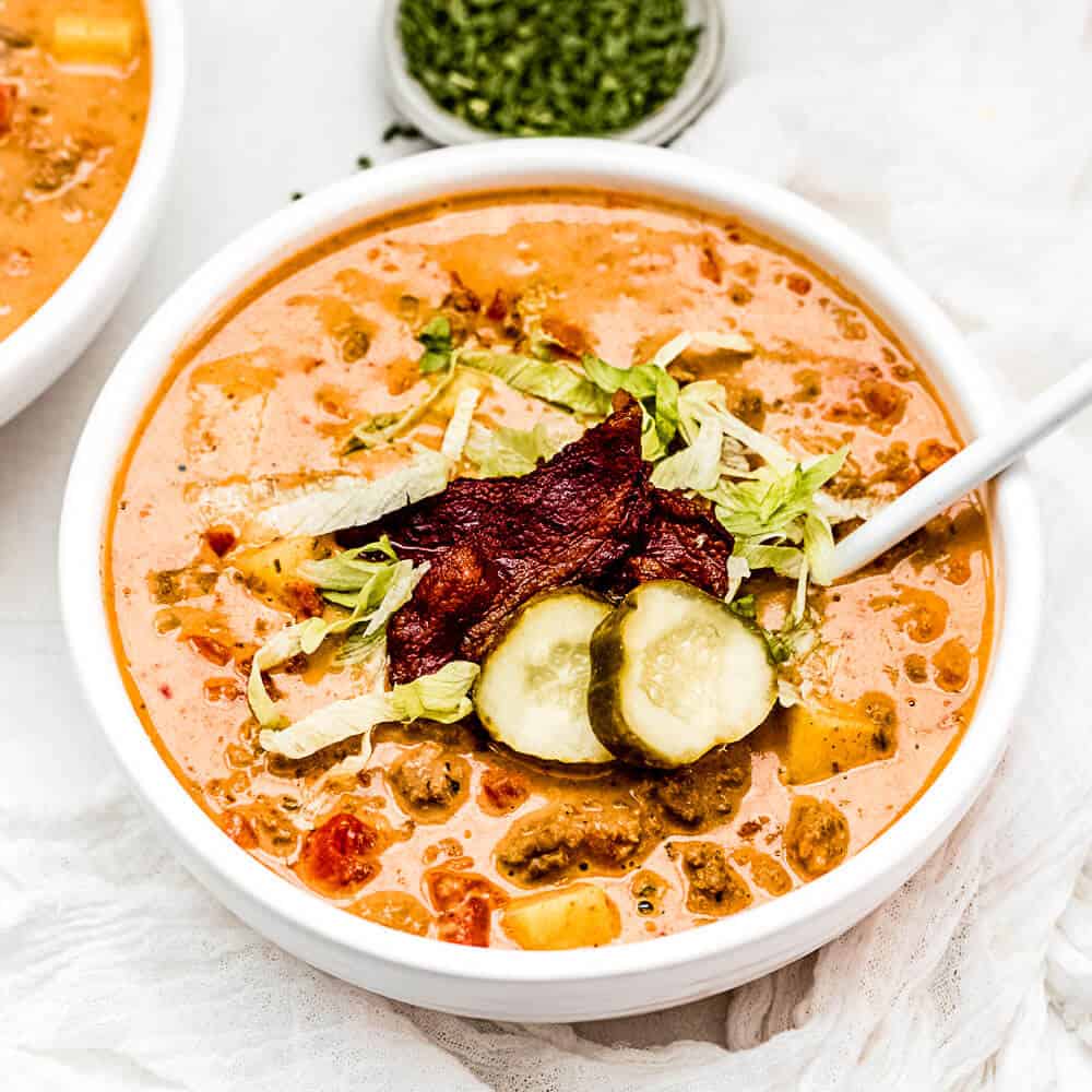 keto bacon cheeseburger soup in a white bowl