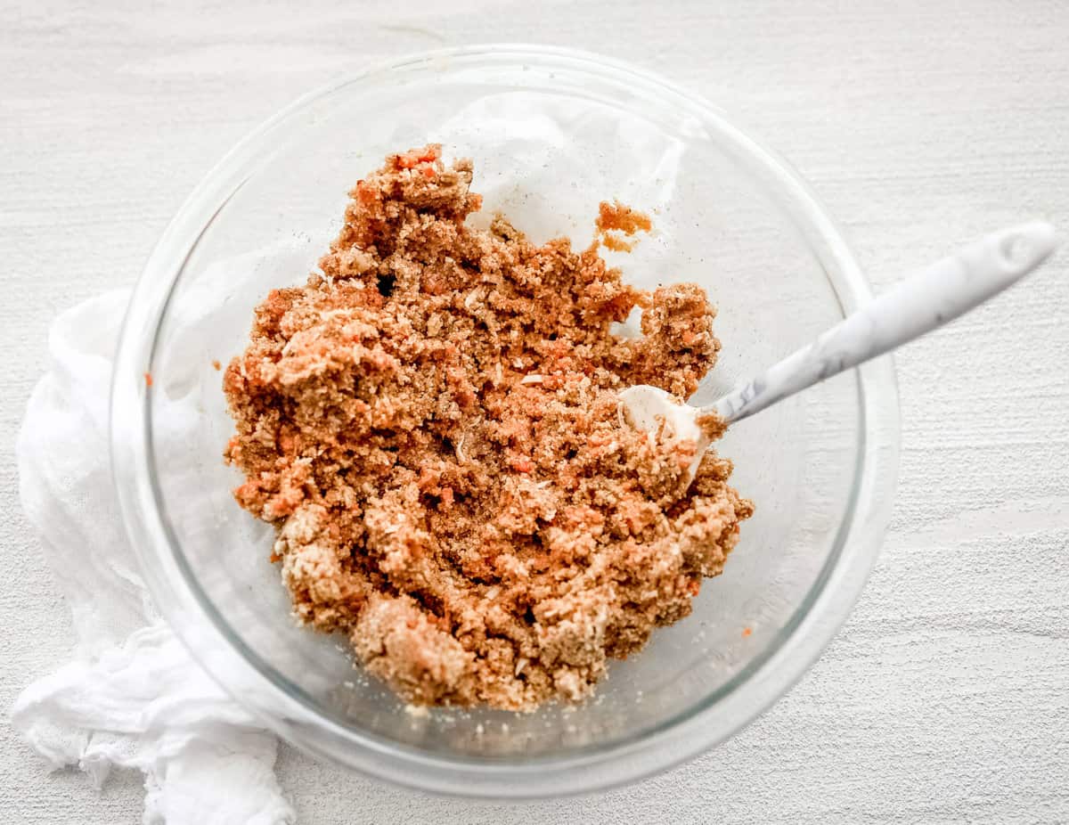 keto carrot cake recipe ingredients in a clear glass bowl