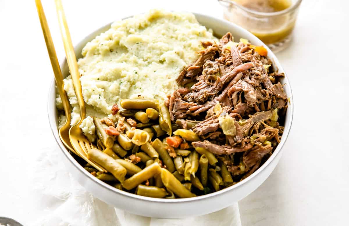 banana pepper pot roast with green beans and mash in a bowl.