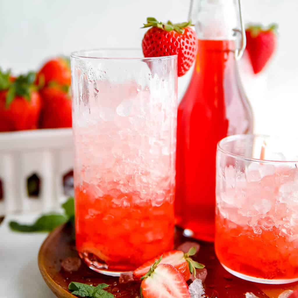 Keto Strawberry Simple Syrup  in glass with ice