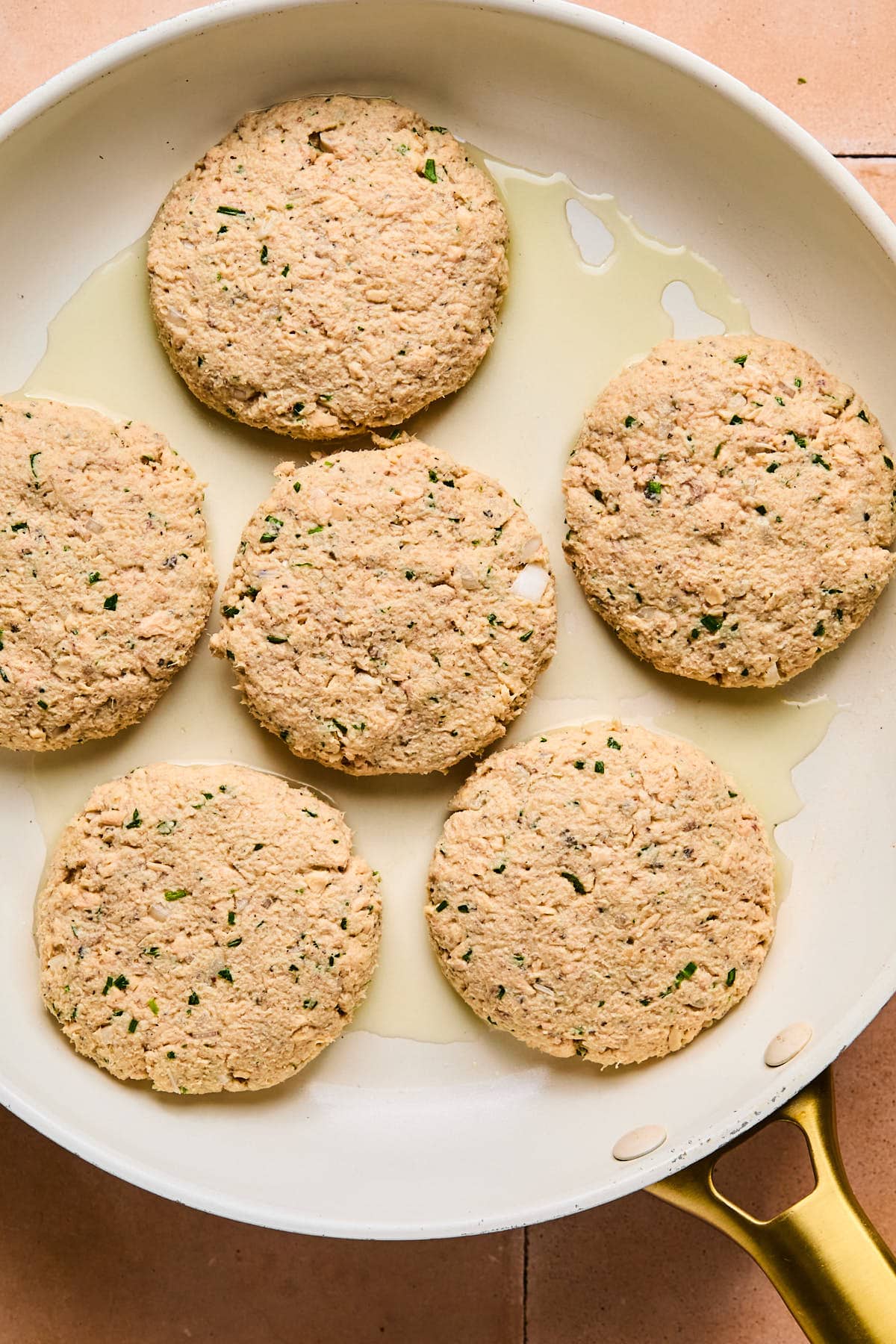 patties in a skillet with oil 