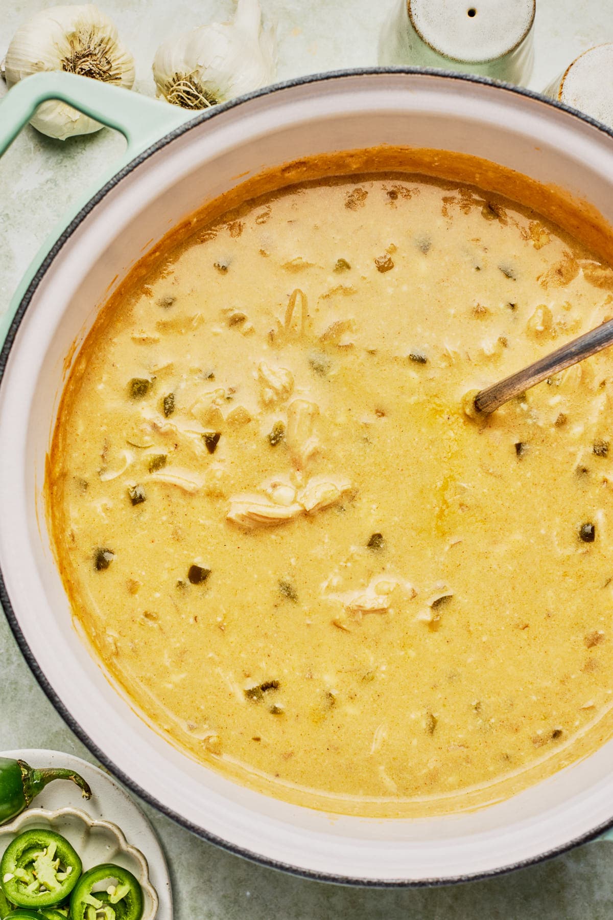 an up close photo of a large soup pot filled with soup