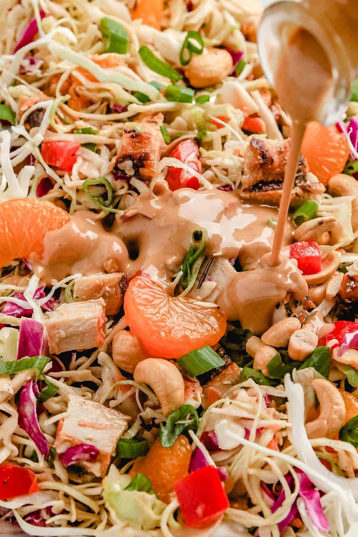 Asian Chicken Salad drizzled with creamy peanut dressing