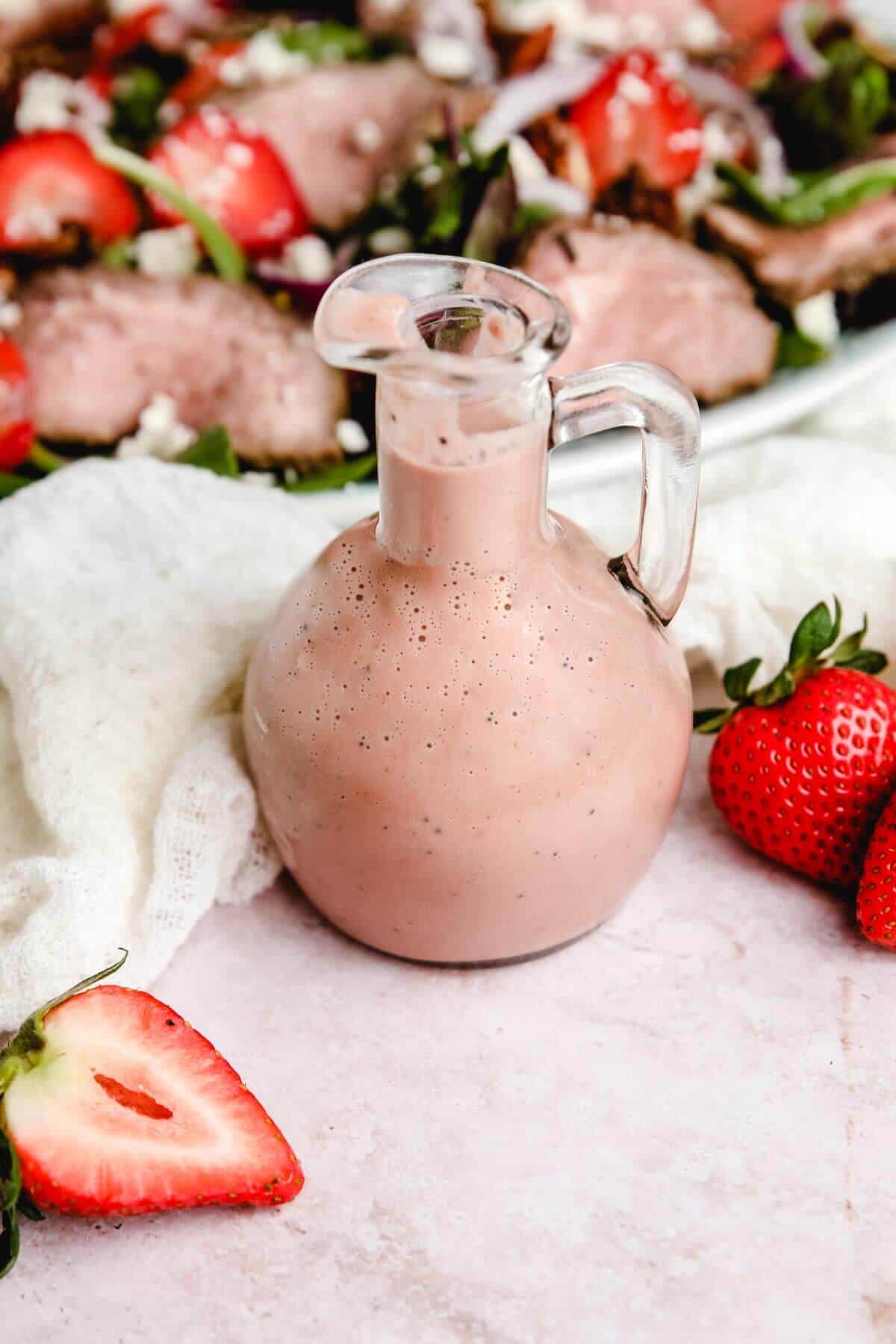 strawberry balsamic poppy seed dressing in a bottle