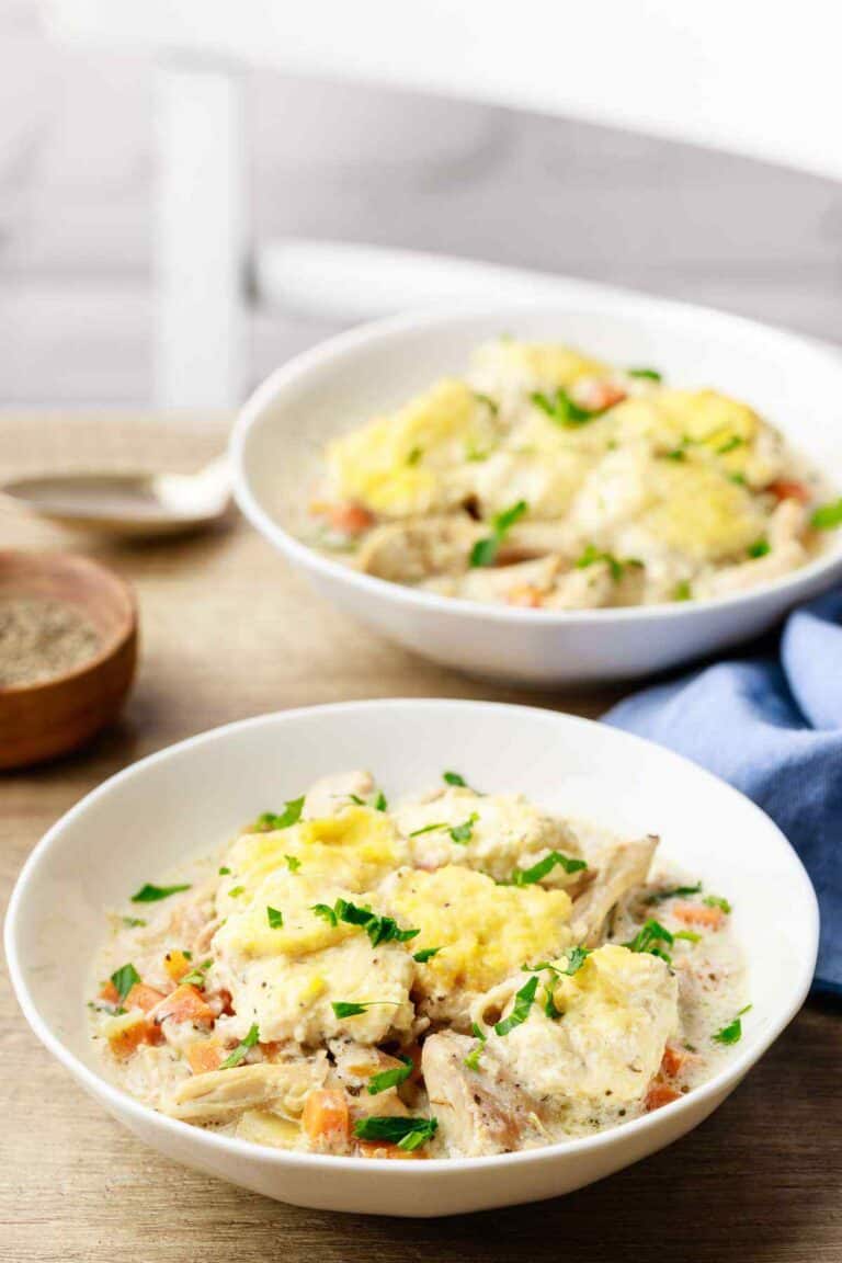 two bowls of chicken and dumplings.