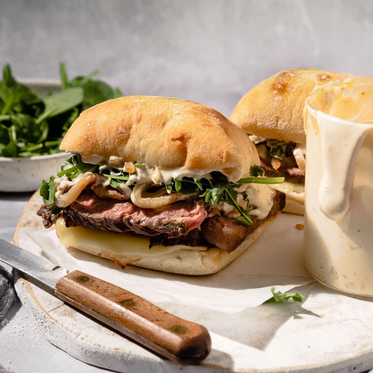 https://healthylittlepeach.com/wp-content/uploads/2023/03/ribeye-steak-sandwich-15.jpg