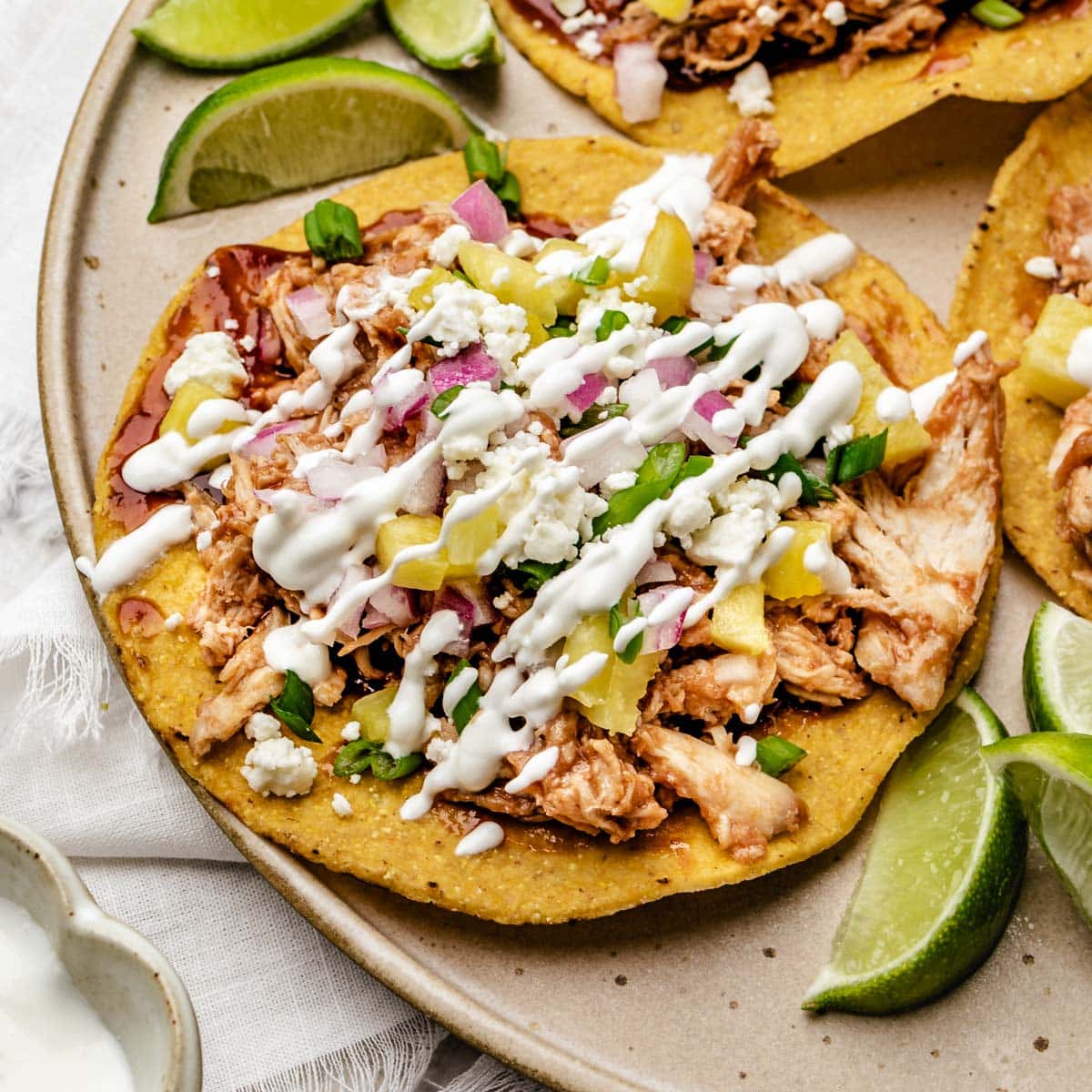 image of BBQ Chicken Tostadas With Easy Lime Crema recipe by Healthy Little Peach