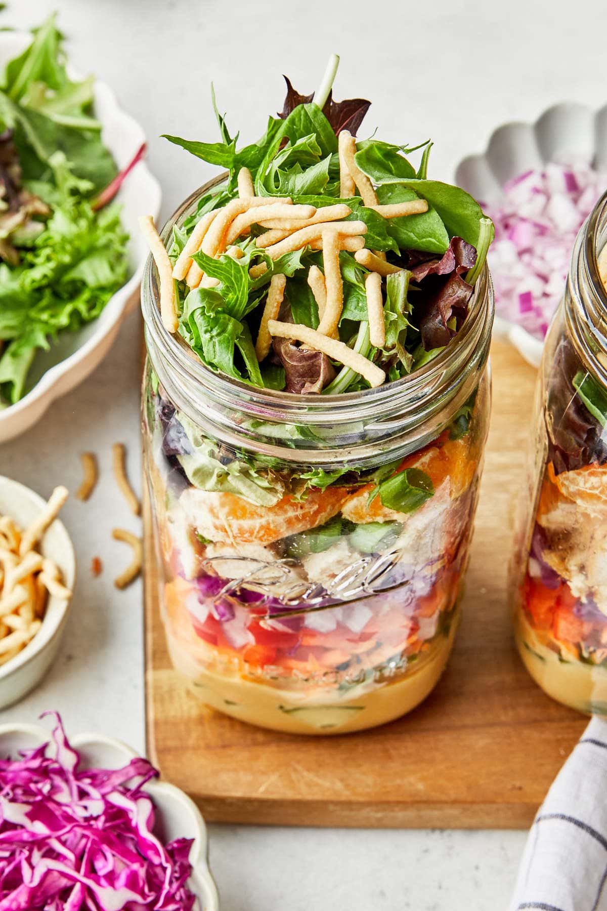 a photo showing the top of an asian chicken mason jar salad