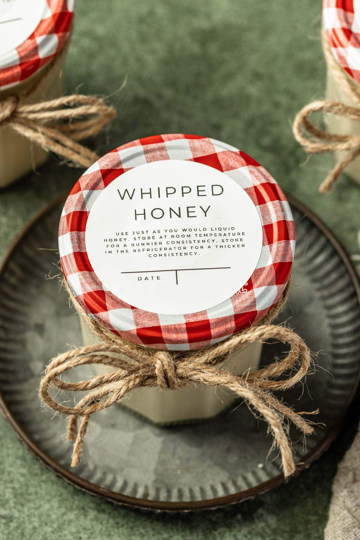 whipped honey in jars with a label on the top