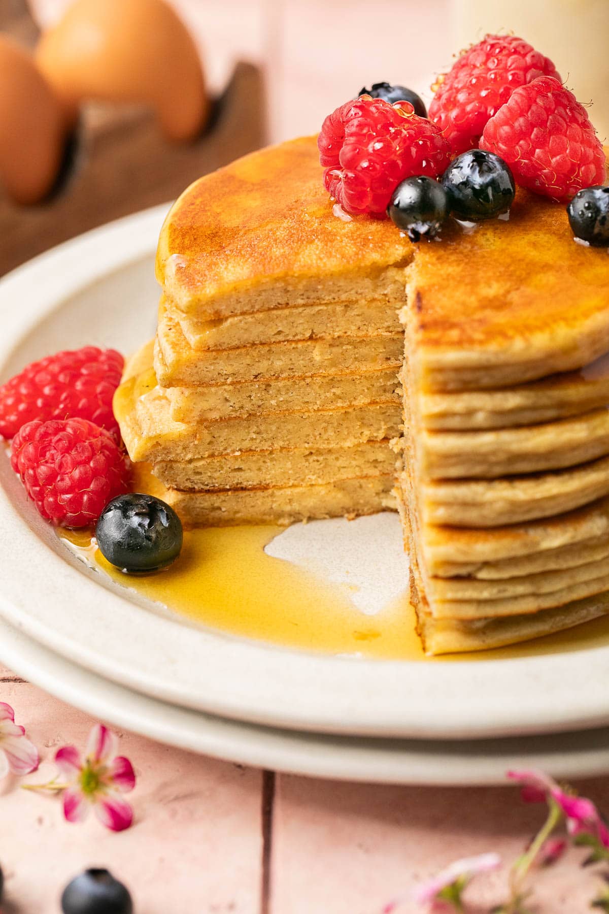 a close up photo of pancakes recipe on a white plate