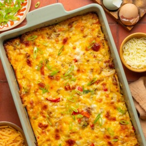 an overhead shot of a hash brown egg casserole in a baking dish