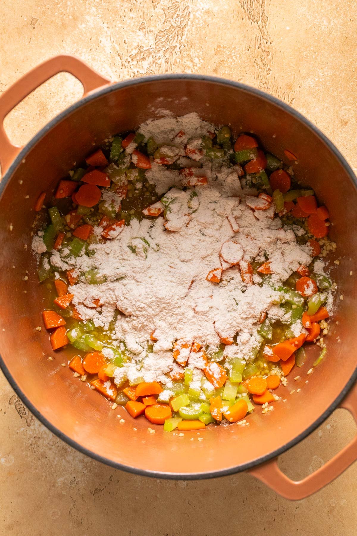 flour on top of cooked veggies