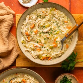 two bowls of creamy chicken and rice soup
