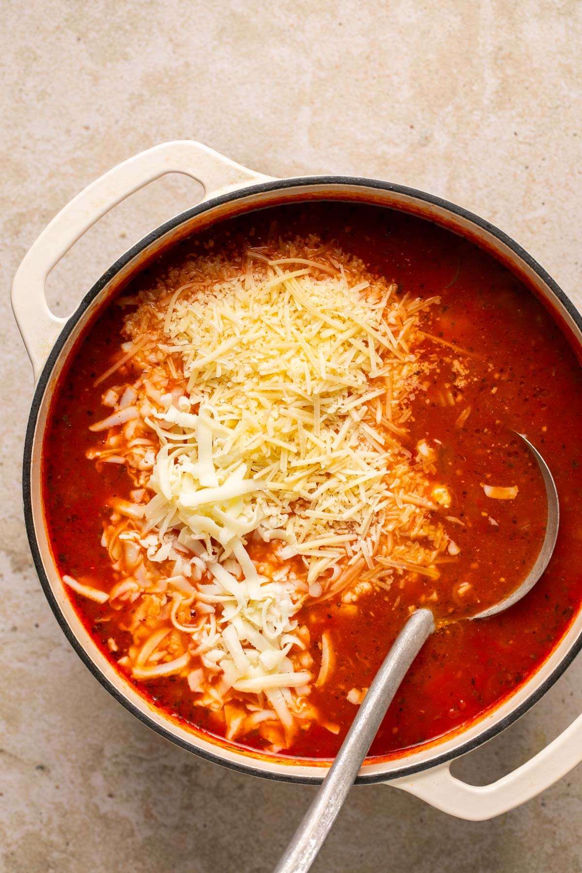 cheeses getting mixed into the soup