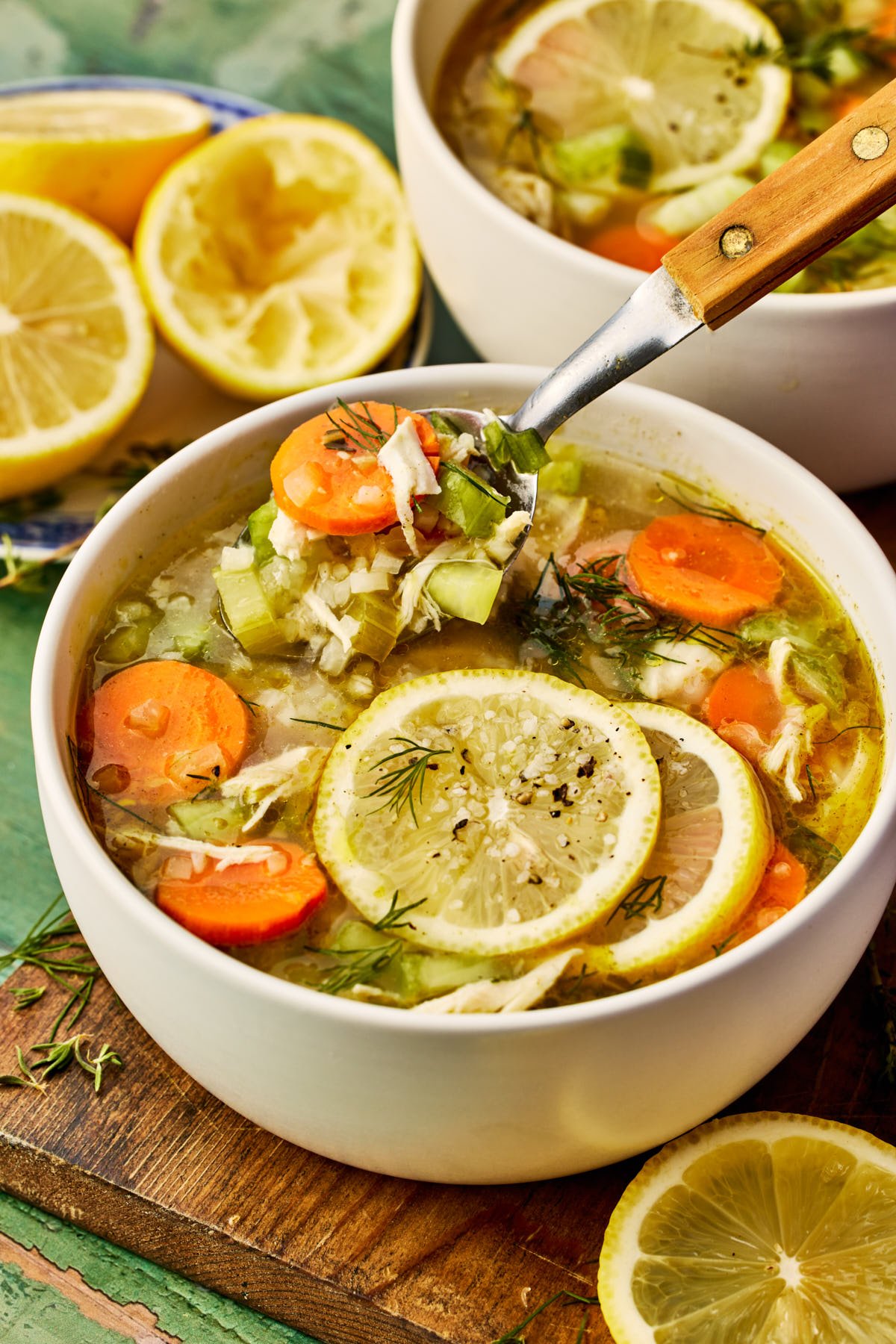 up close photo of a white bowl filled with soup 