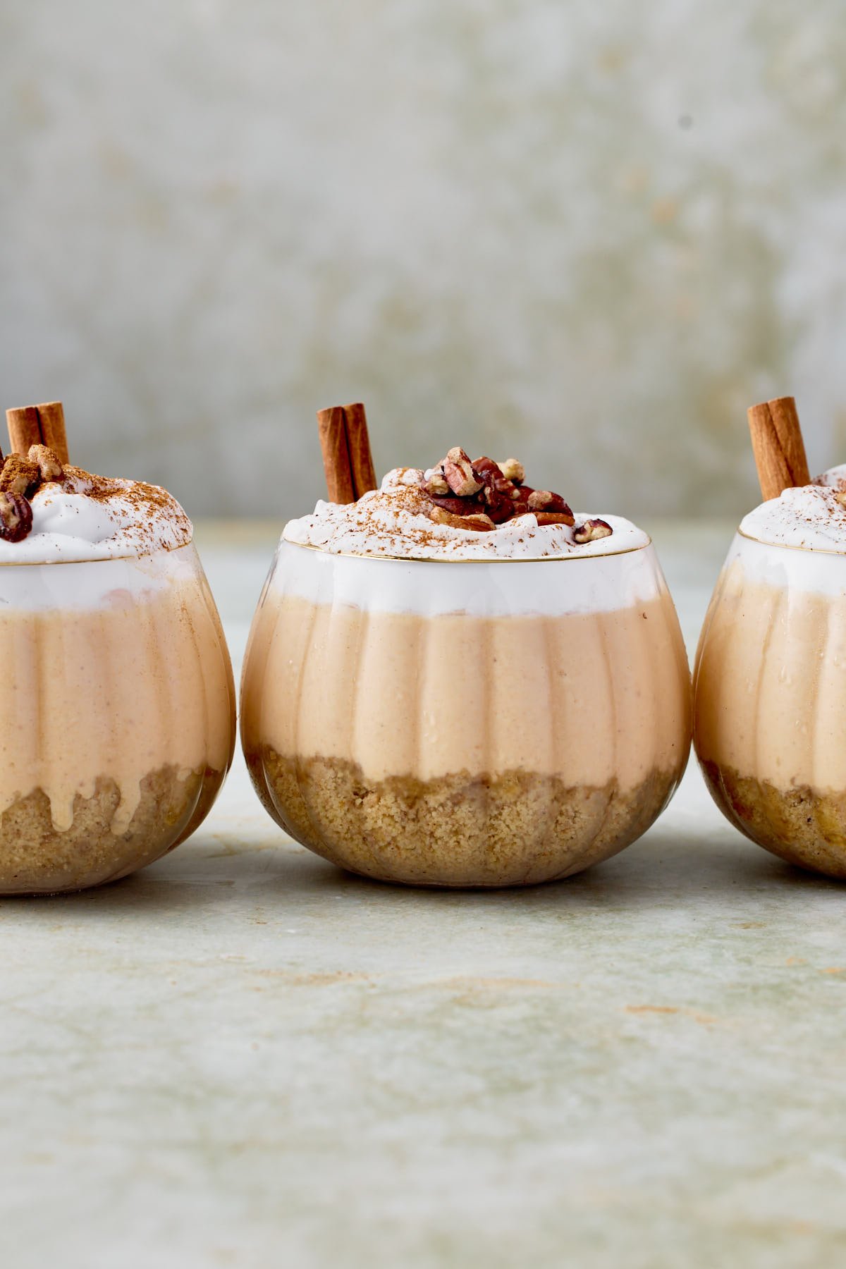 three side by side jars of cheesecake