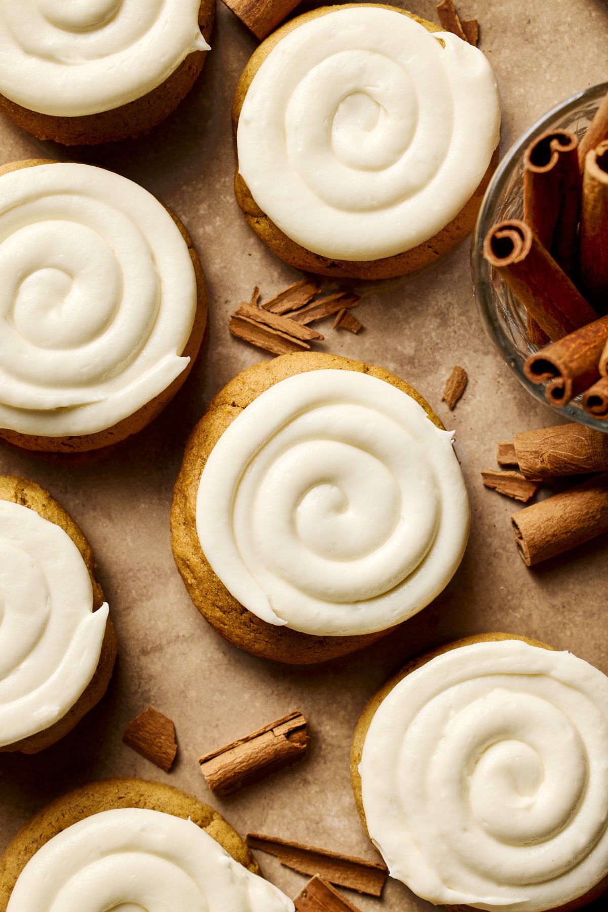 an overhead shot of gluten free pumpkin cookies frosted with cream cheese icing