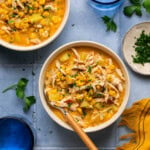 a bowl of southwest chicken chowder topped with toppings