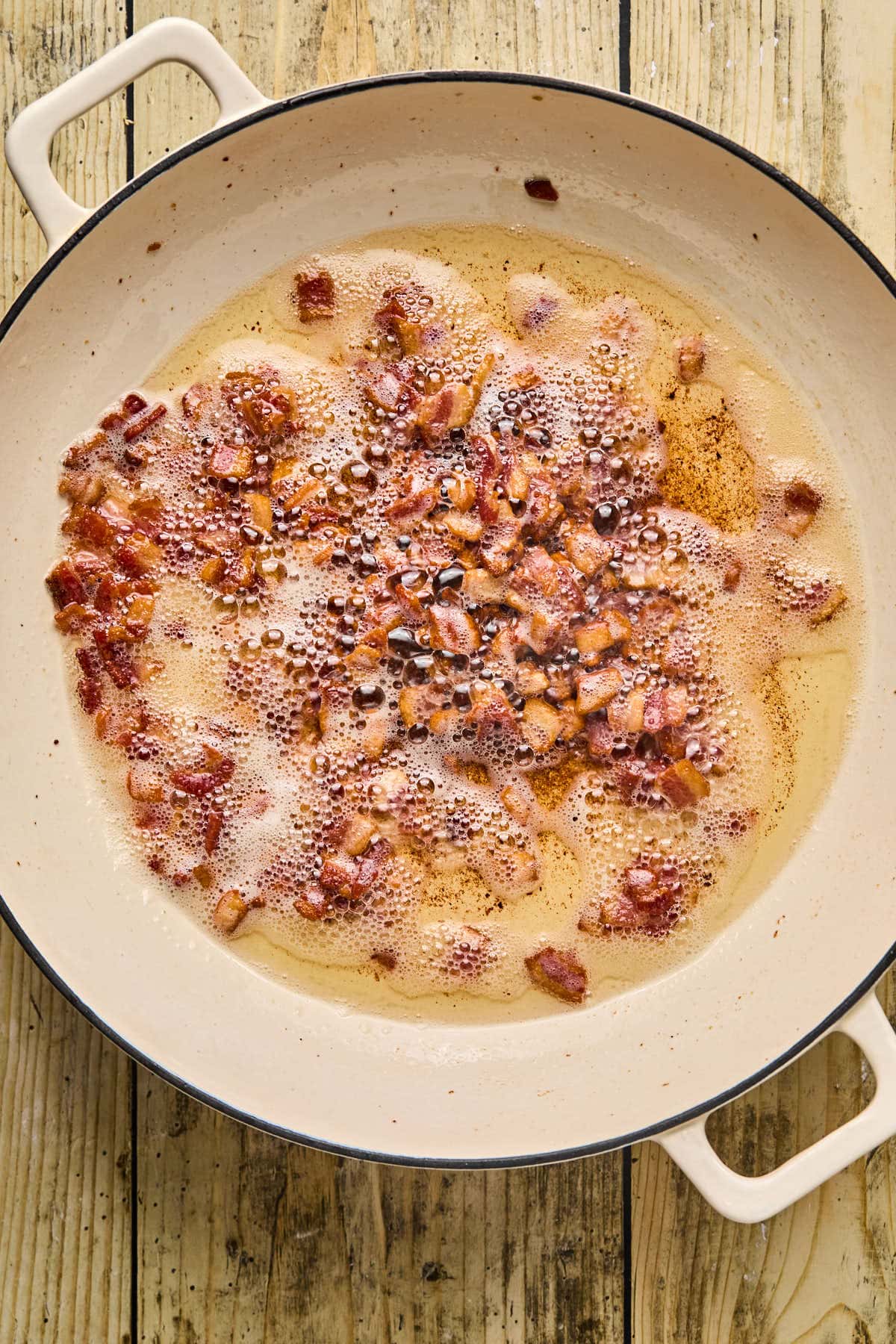 bacon cooking in a skillet 