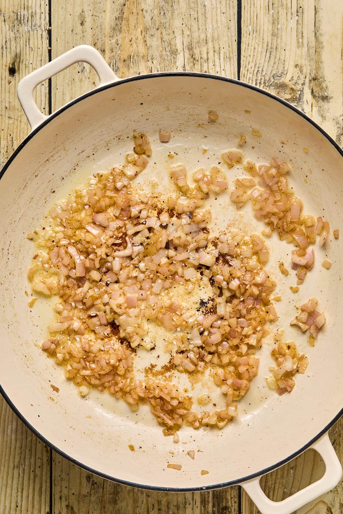 sauteeing onions in a skillet