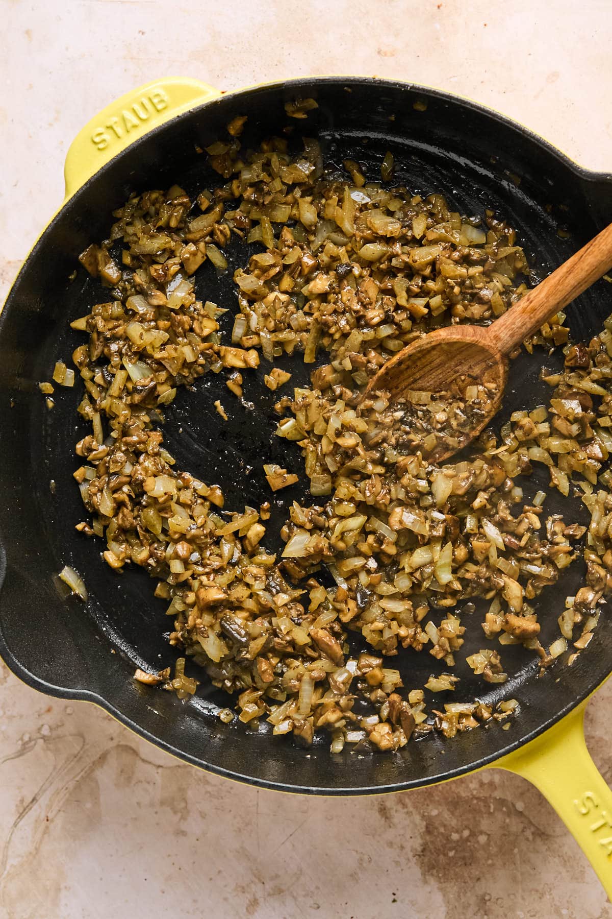 sauteeing onions in a pan. 