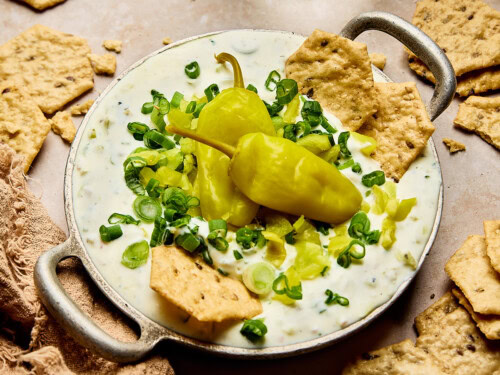 sour cream pepperoncini dressing This Pepperoncini Dressing is the flavor bomb your salads, sandwiches, and bowls have been waiting for! Ready in minutes, packed with zesty heat + creamy tang, and made with clean, simple ingredients