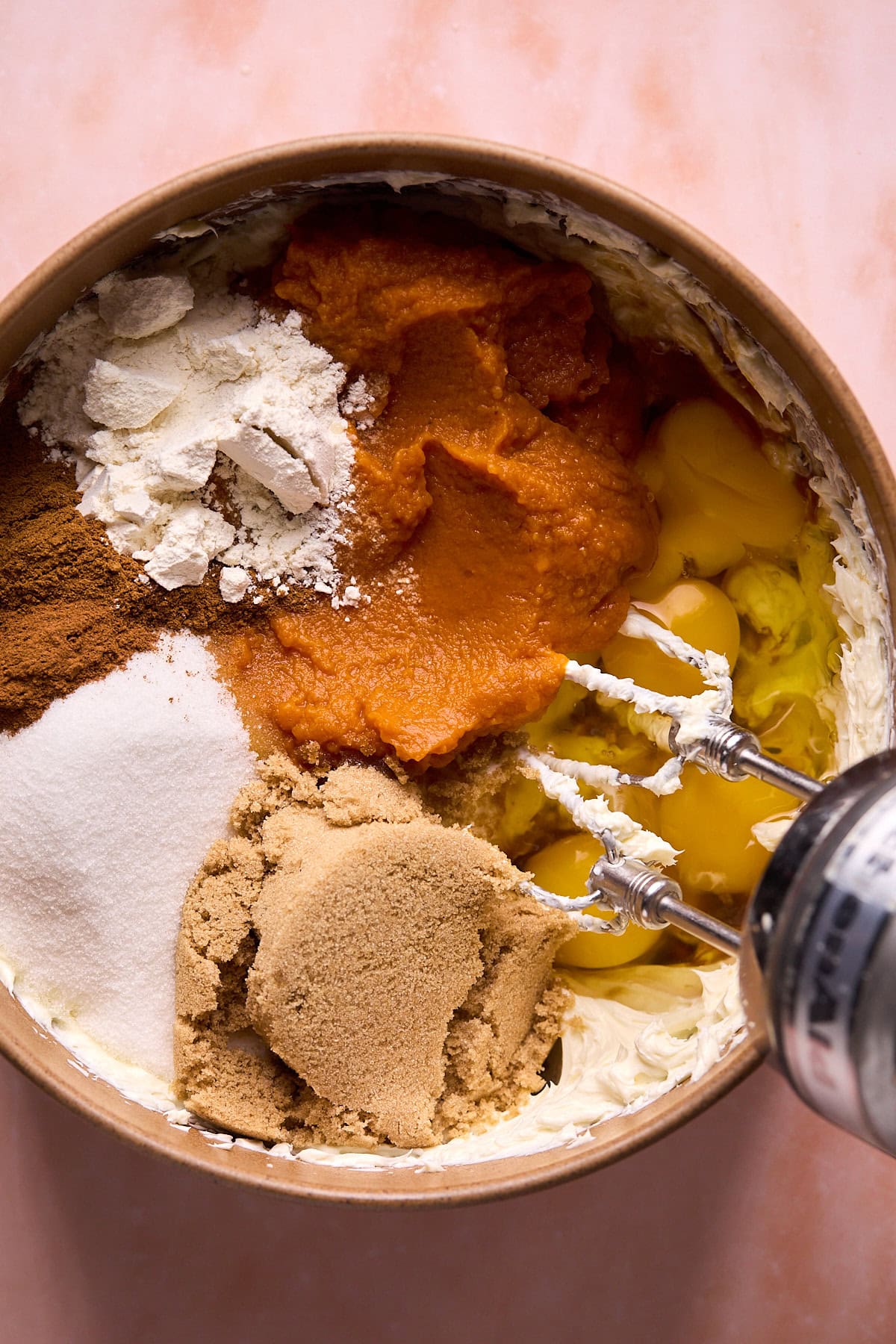 cheesecake ingredients in a mixing bowl.