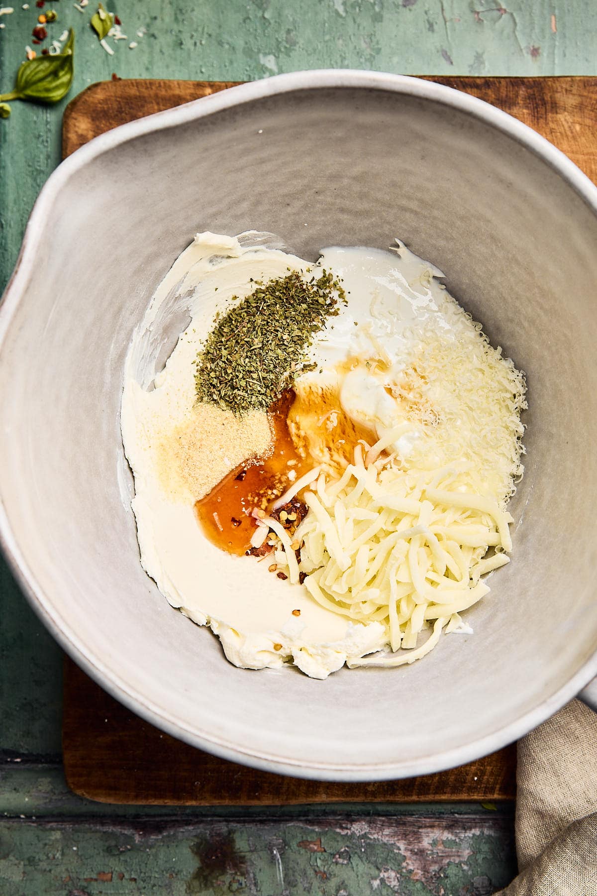 cream cheese and spices in a mixing bowl