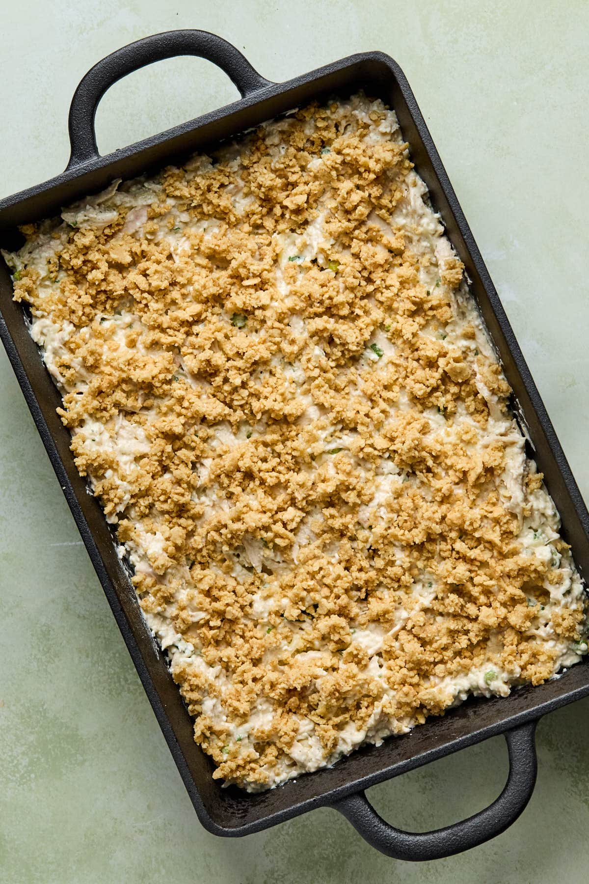 the baking dish topped with cracker crumbs