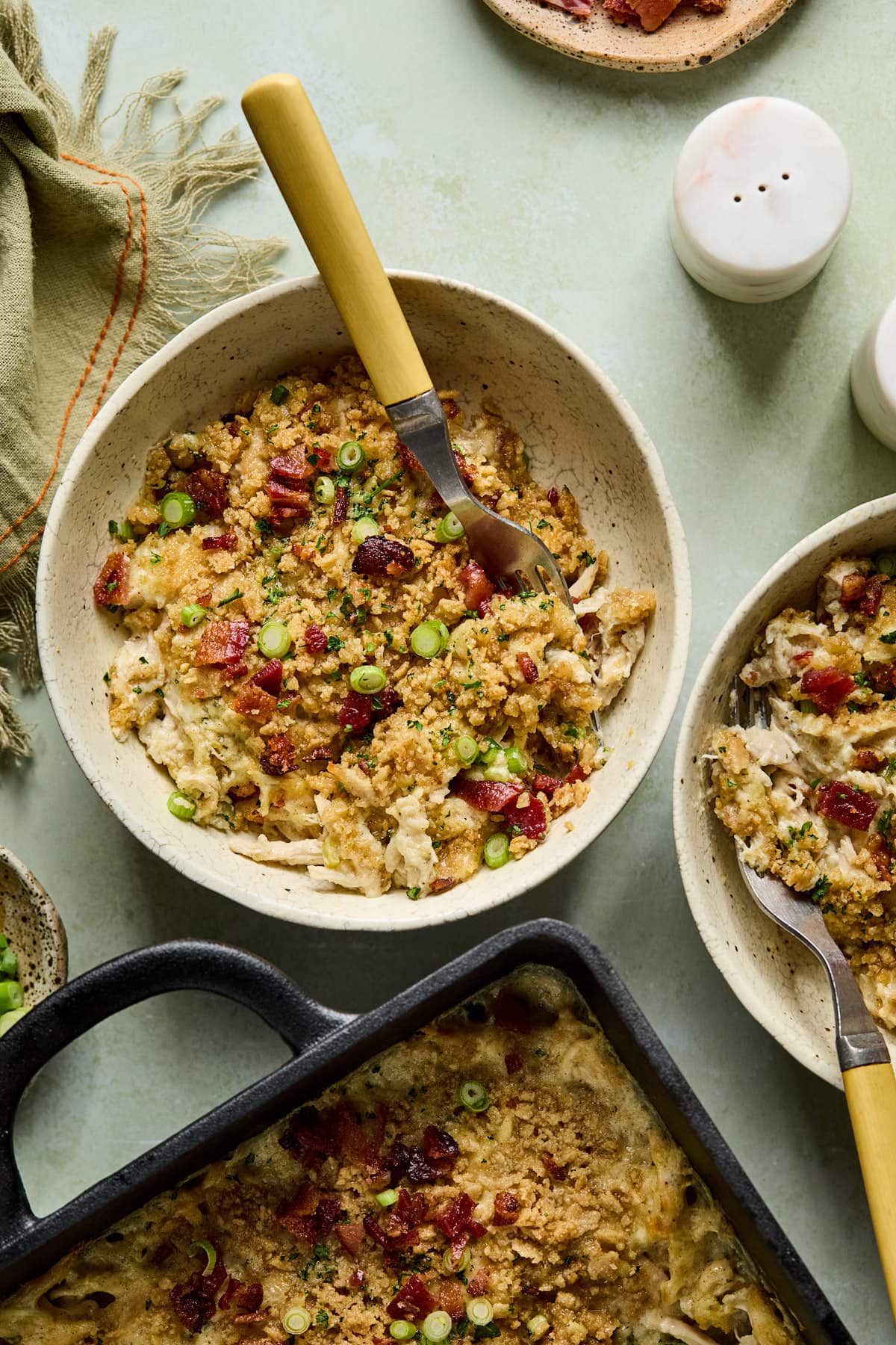 a serving of the casserole in a bowl with a fork 