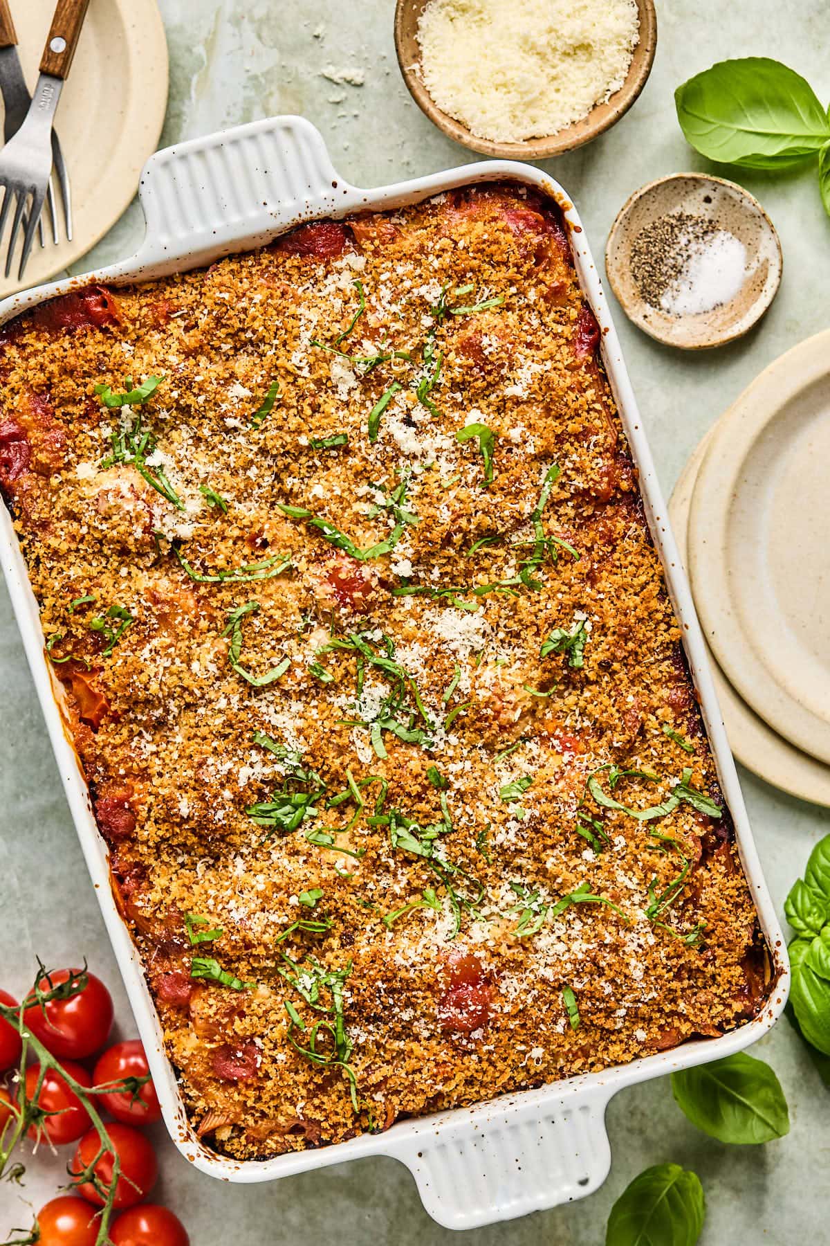 a baked casserole topped with basil 