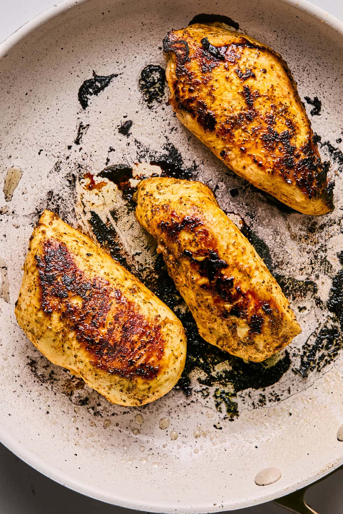 cooked chicken in a frying pan 