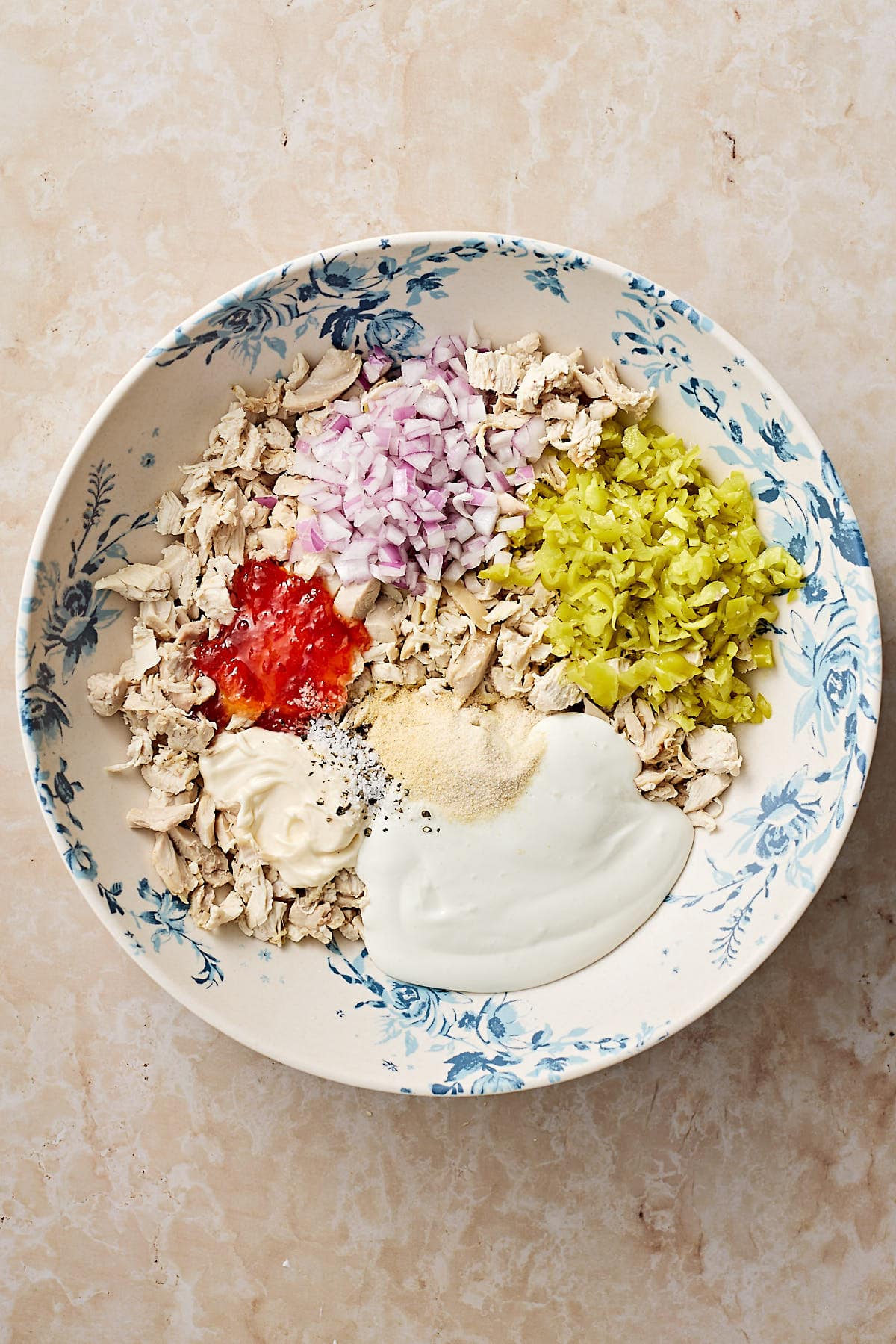 chicken salad ingredients in a bowl 