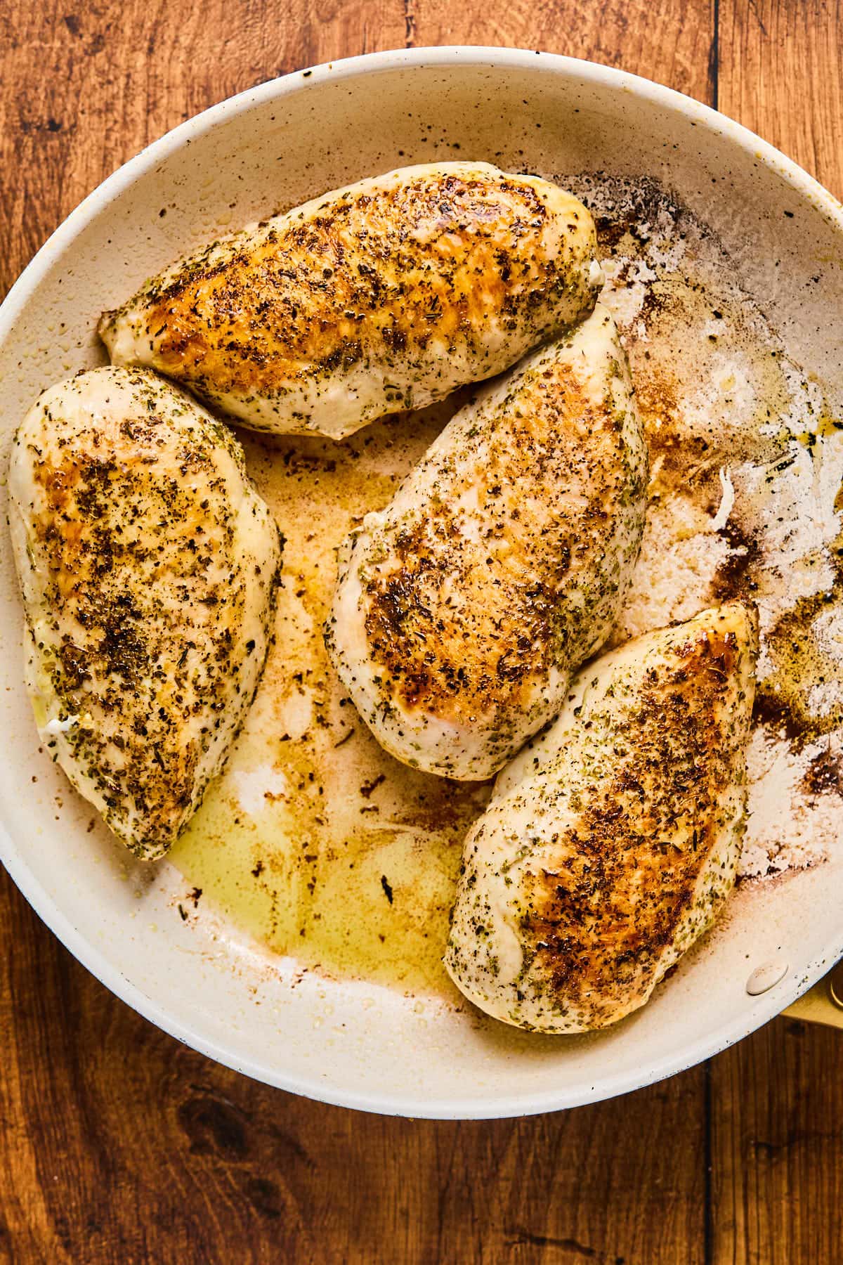 chicken breasts in a skillet