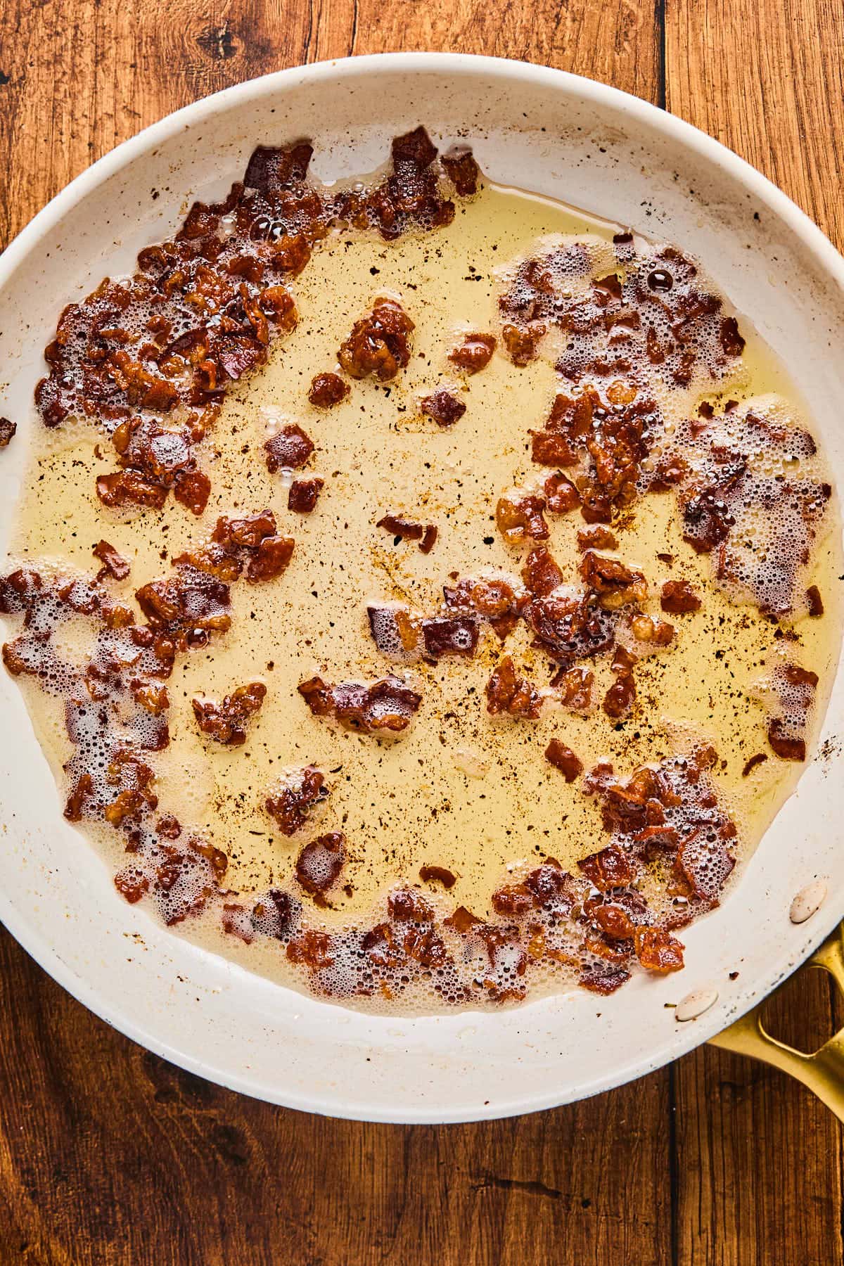 bacon pieces in a skillet