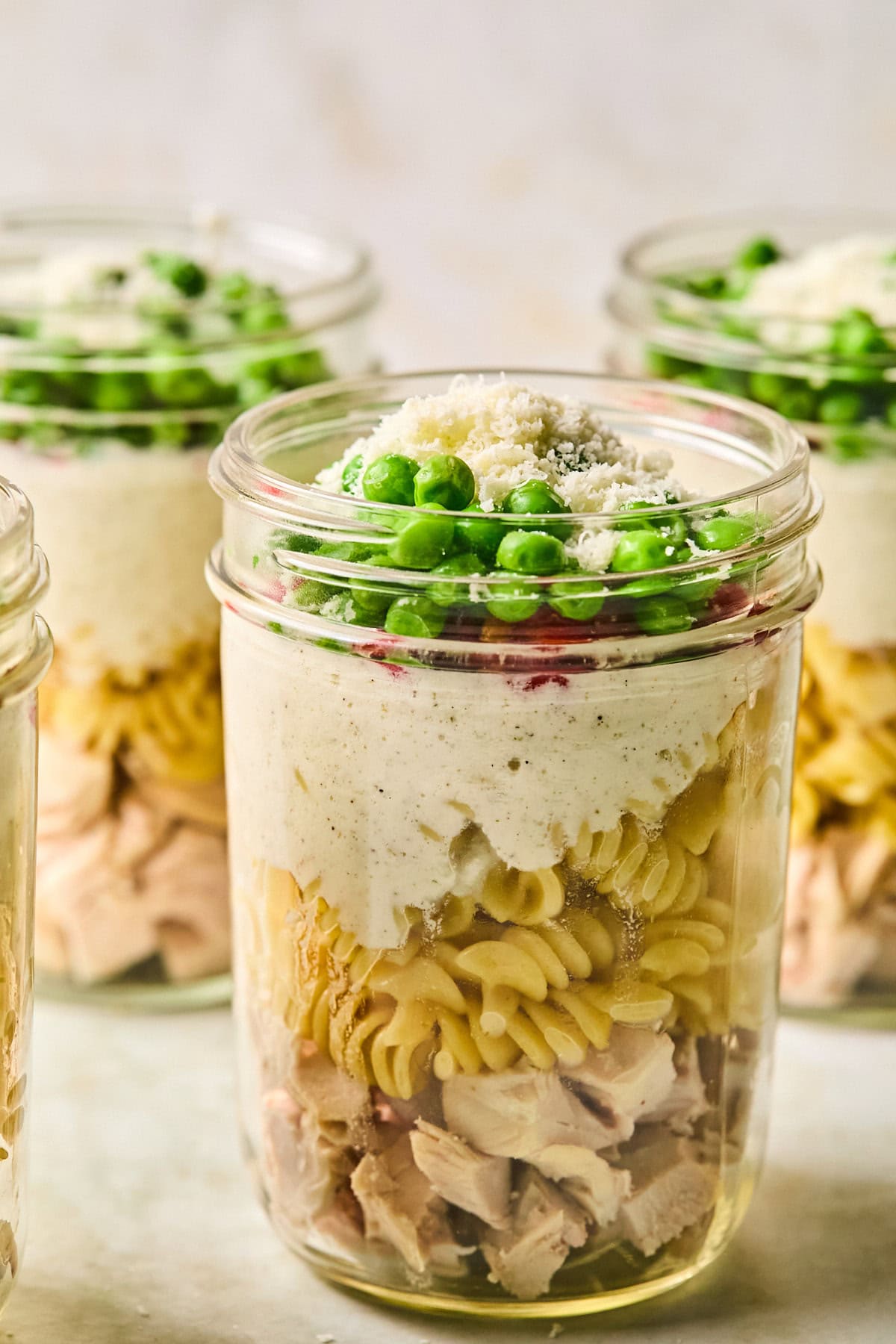 meal prep alfredo pasta in a mason jar