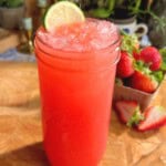 homemade strawberry gatorade in a mason jar and garnished with a lime
