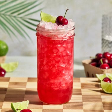 cherry limeade gatorade in a mason jar with ice