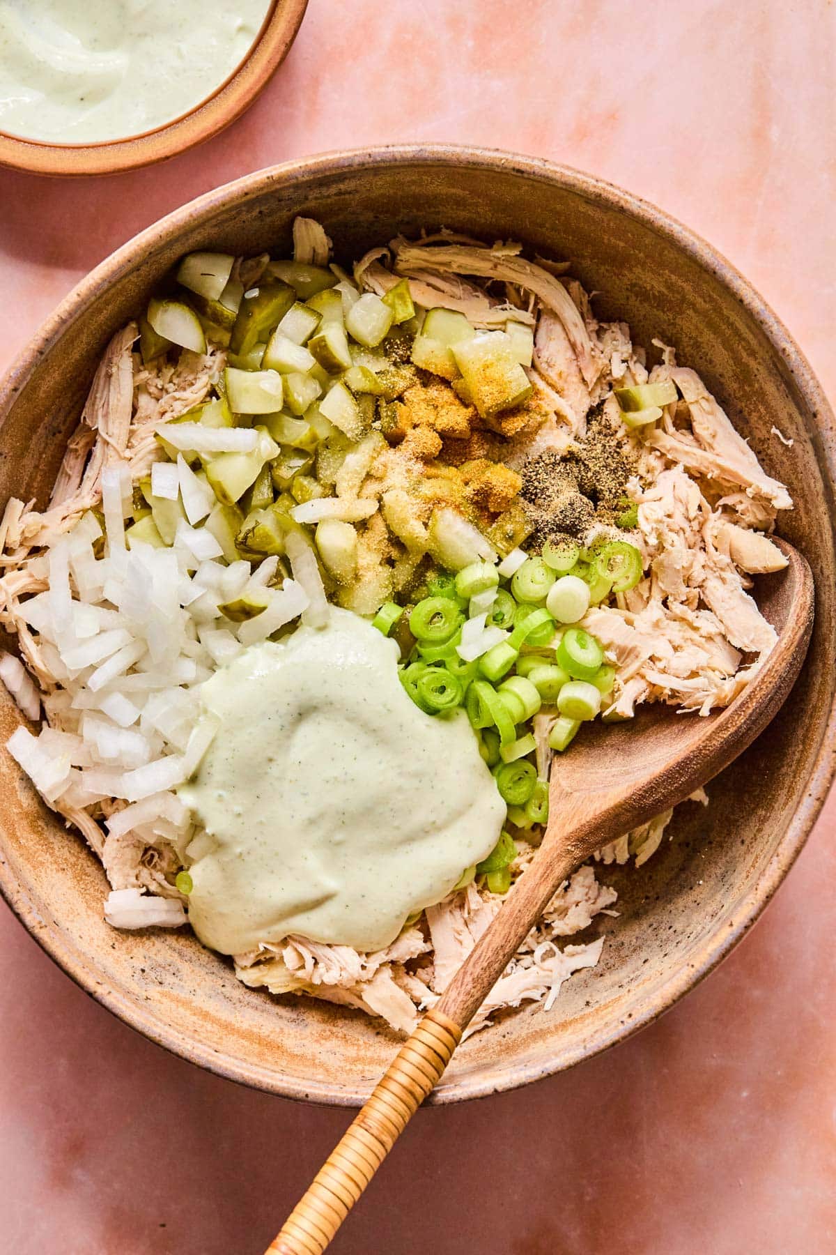 ingredients for dill pickle chicken salad in a bowl before combining. 