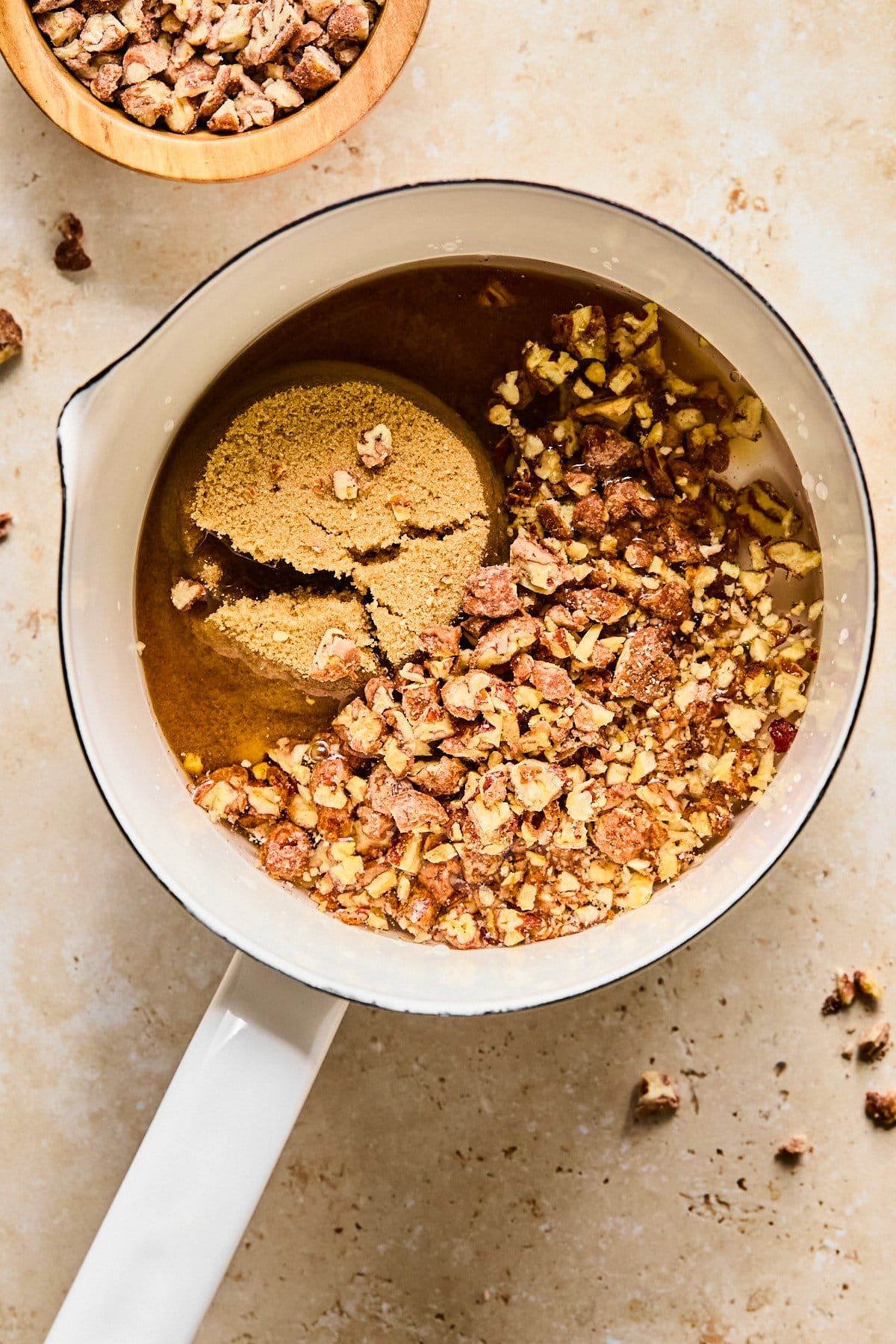 Ingredients for pecan syrup in a pot, ready to simmer.